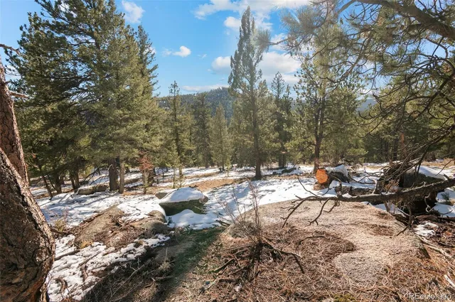 a view of mountains and valleys