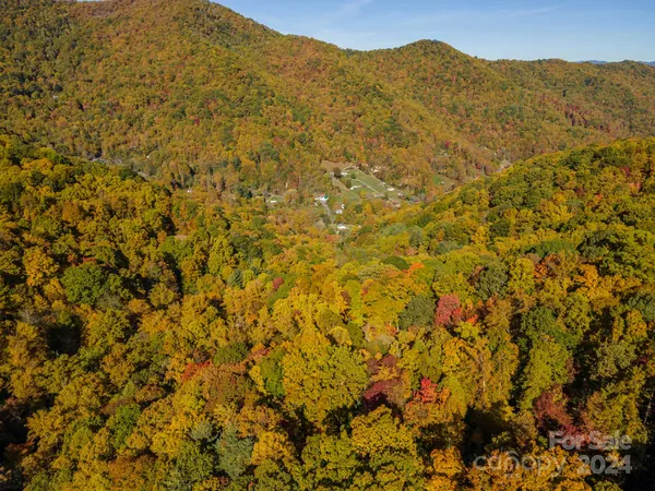 a view of an aerial view of mountain with an ocean