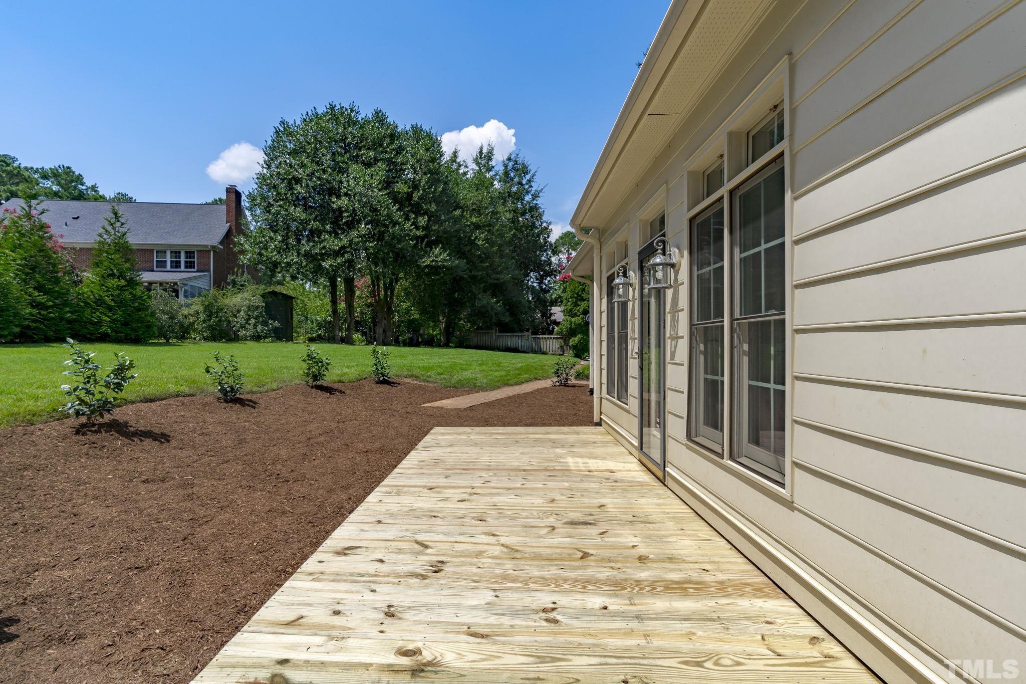 2417 Beechview Court Raleigh, NC 27615 - Photo 36 of 43 a view of a backyard with pathway