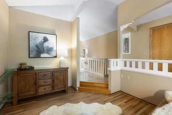 a view of a bedroom with baby crib