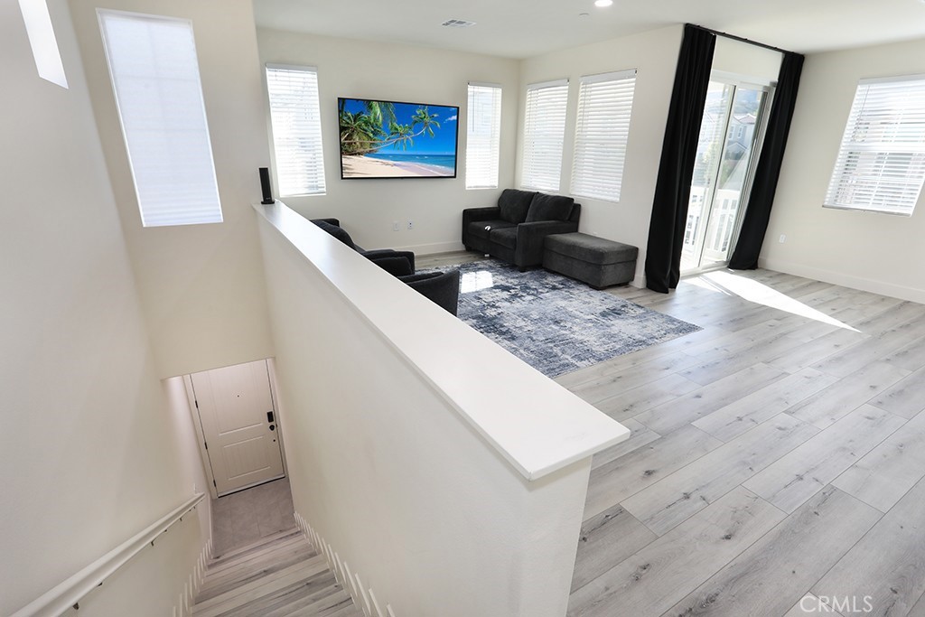 4067 Summer Corona, CA 92883 - Photo 2 of 28 a living room with furniture and a window