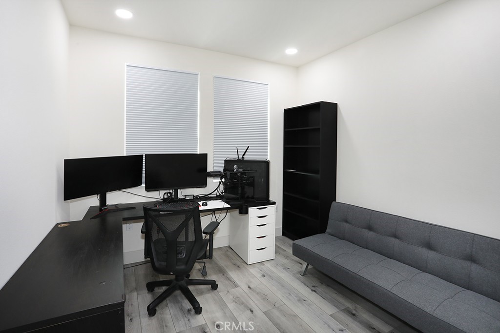 4067 Summer Corona, CA 92883 - Photo 8 of 28 a living room with furniture and a laptop