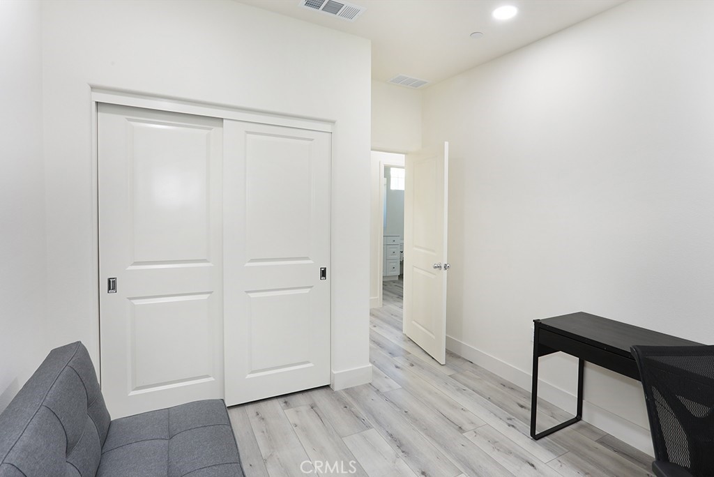 4067 Summer Corona, CA 92883 - Photo 9 of 28 a view of empty room with wooden floor