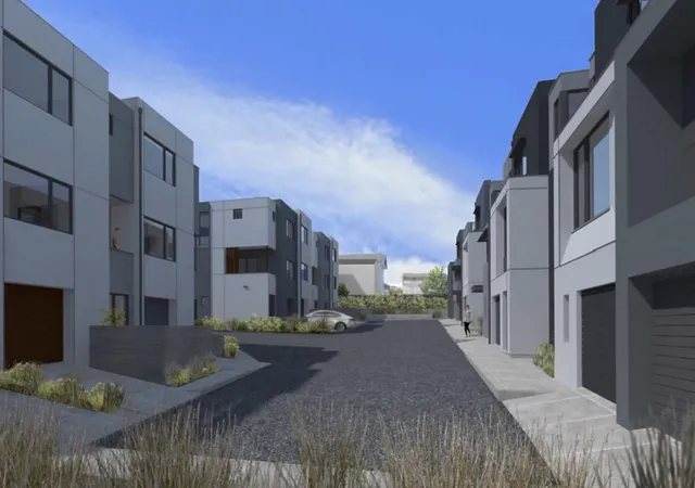 a view of a street with buildings