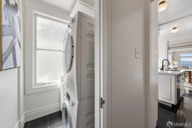 a bathroom with a sink a mirror and a window