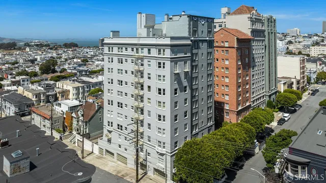 a large building with a clock on the side of it