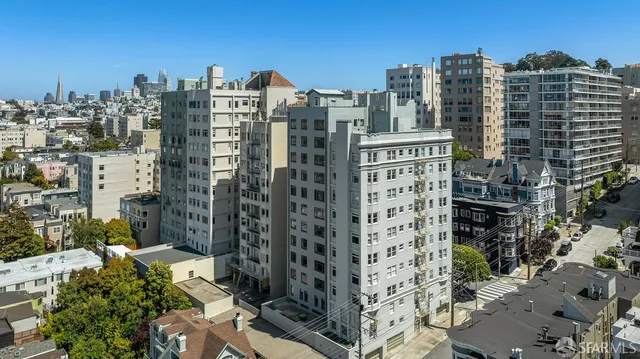 a view of a city with tall buildings
