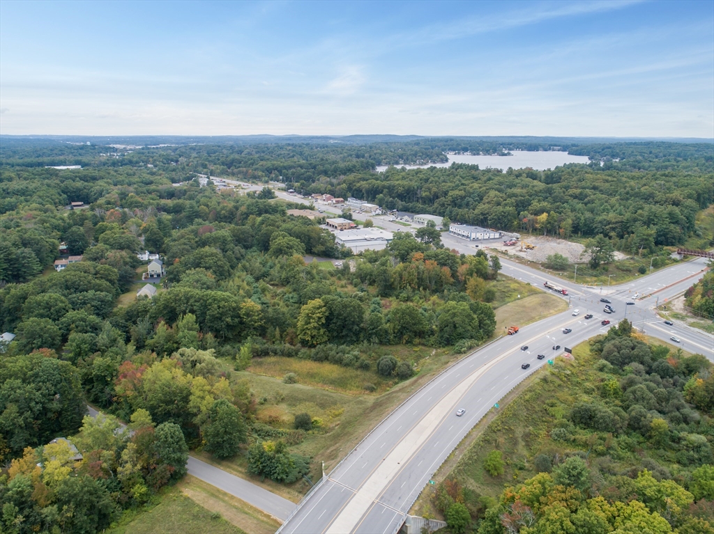24 Rockingham Road Windham, NH 03087 - Photo 4 of 10 an aerial view of residential houses with outdoor space and trees