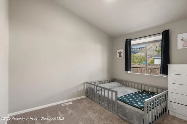 a view of room with window and racks