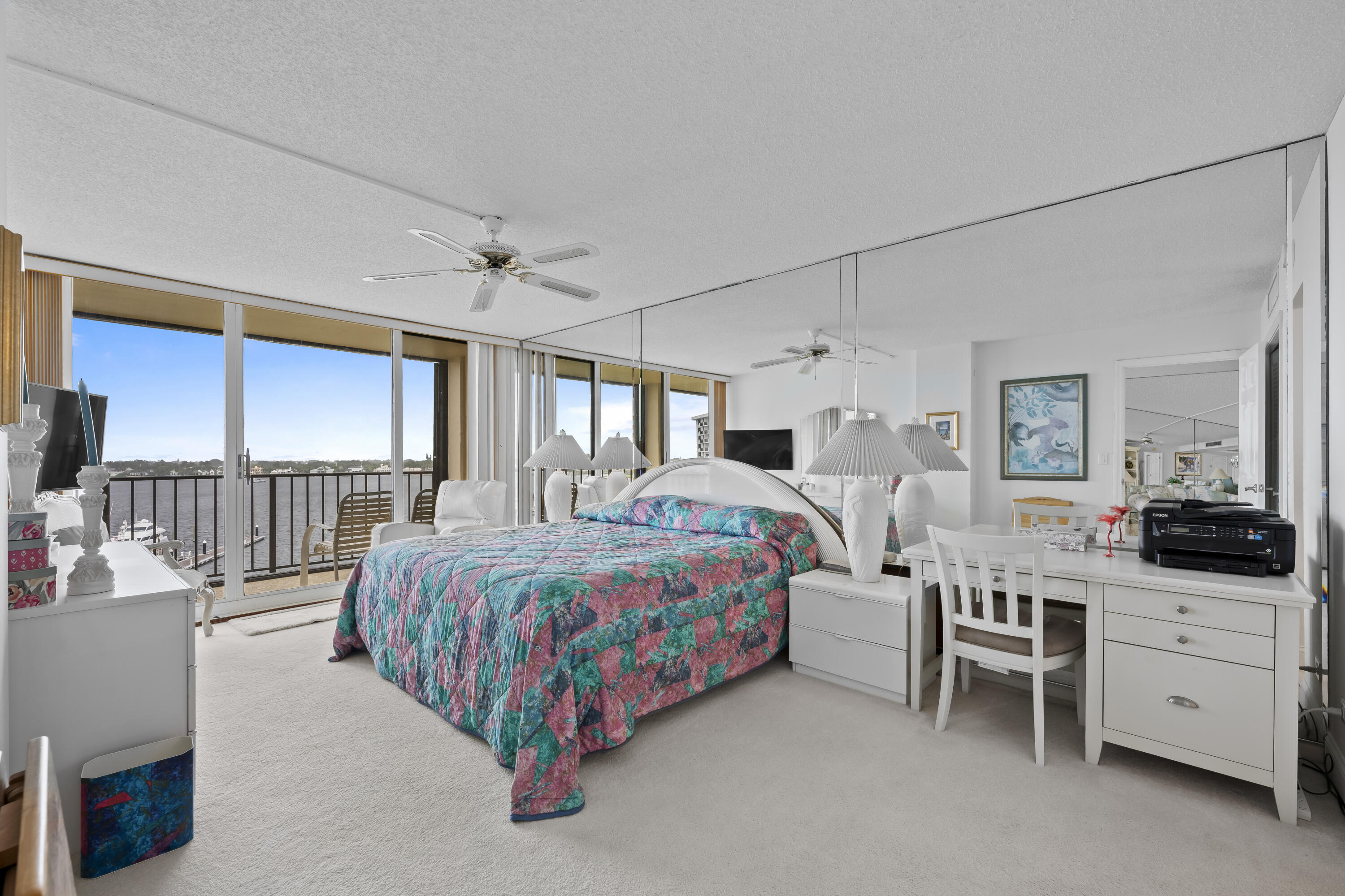 134 Lakeshore Drive, Unit 814 North Palm Beach, FL 33408 - Photo 12 of 30 a bed room with a bed and a window