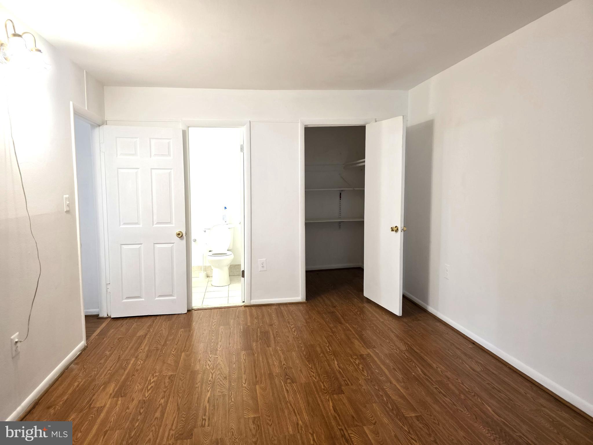 3376 Woodburn Road, Unit 32 Annandale, VA 22003 - Photo 14 of 21 an empty room with wooden floor