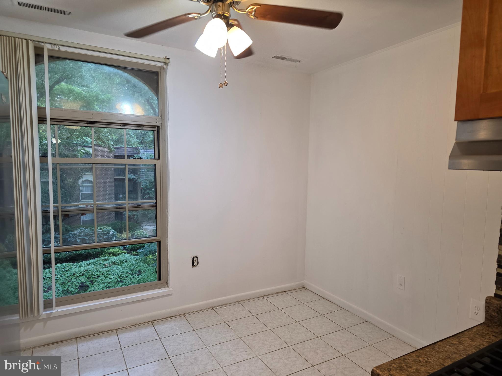 3376 Woodburn Road, Unit 32 Annandale, VA 22003 - Photo 5 of 21 an empty room with a window