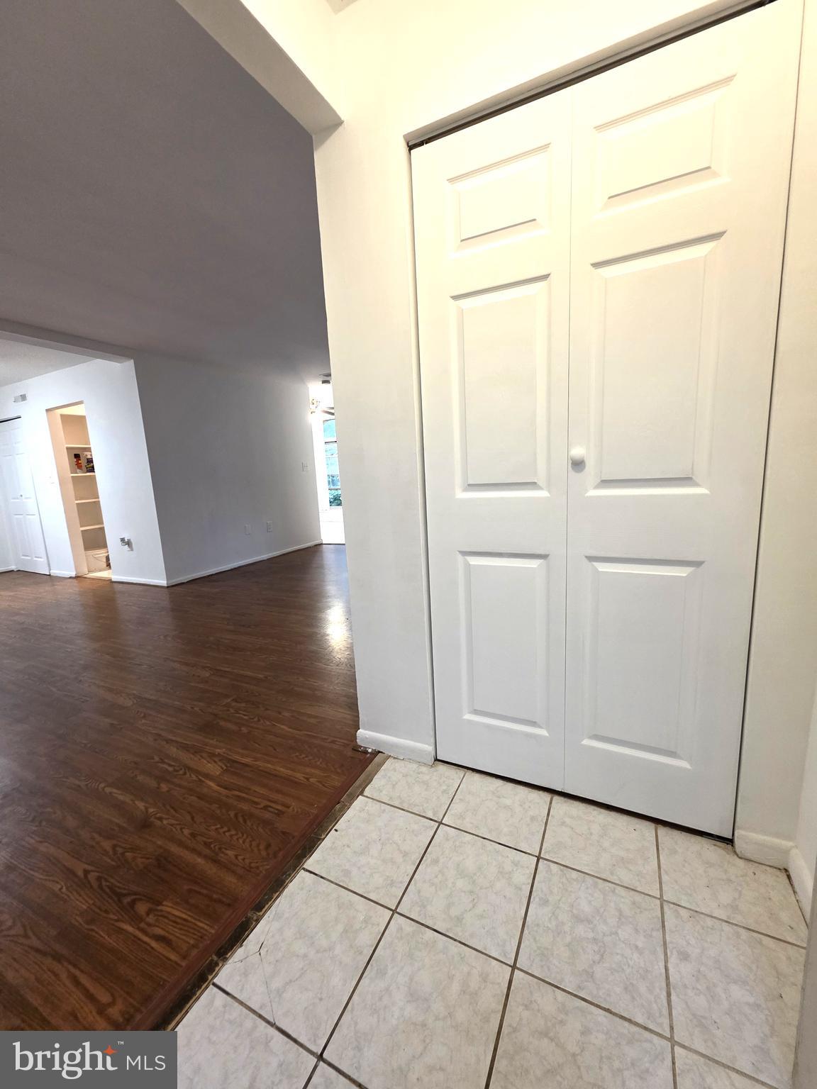 3376 Woodburn Road, Unit 32 Annandale, VA 22003 - Photo 7 of 21 a view of an empty room and wooden floor