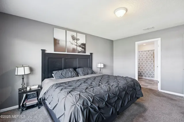 a view of a dining room with furniture and a wooden floor