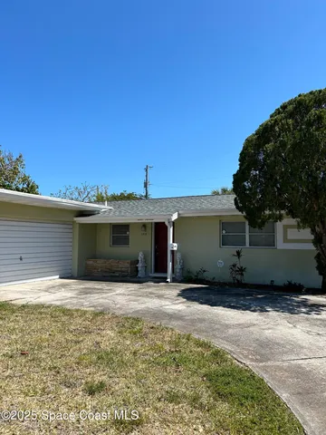 a view of a house with a garage
