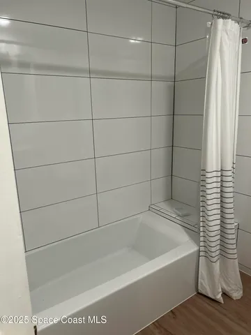 a bathroom with a bathtub
