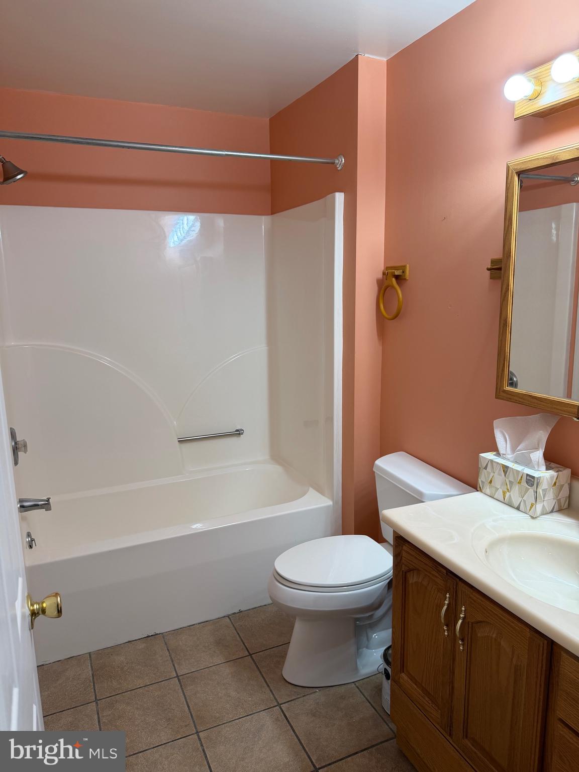 32841 East Riga Drive Ocean View, DE 19970 - Photo 17 of 33 a bathroom with a sink a toilet and shower