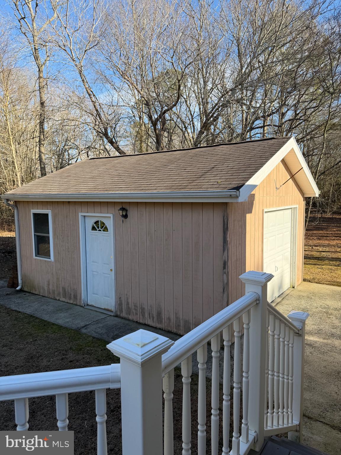 32841 East Riga Drive Ocean View, DE 19970 - Photo 30 of 33 a view of house with backyard and wooden fence