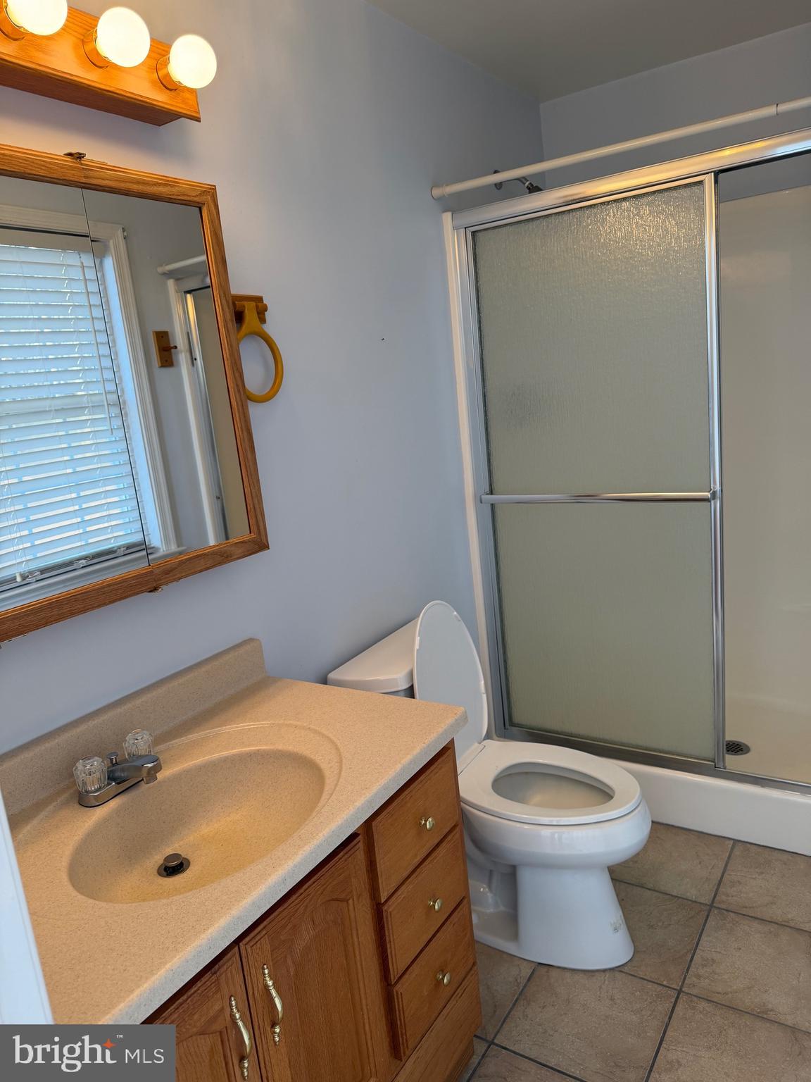 32841 East Riga Drive Ocean View, DE 19970 - Photo 9 of 33 a bathroom with a sink toilet and shower