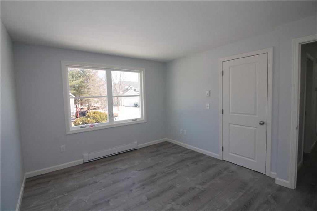 55 Tasker Street Saco, ME 04072 - Photo 6 of 19 Bedroom #1. New sheetrock, paint,...