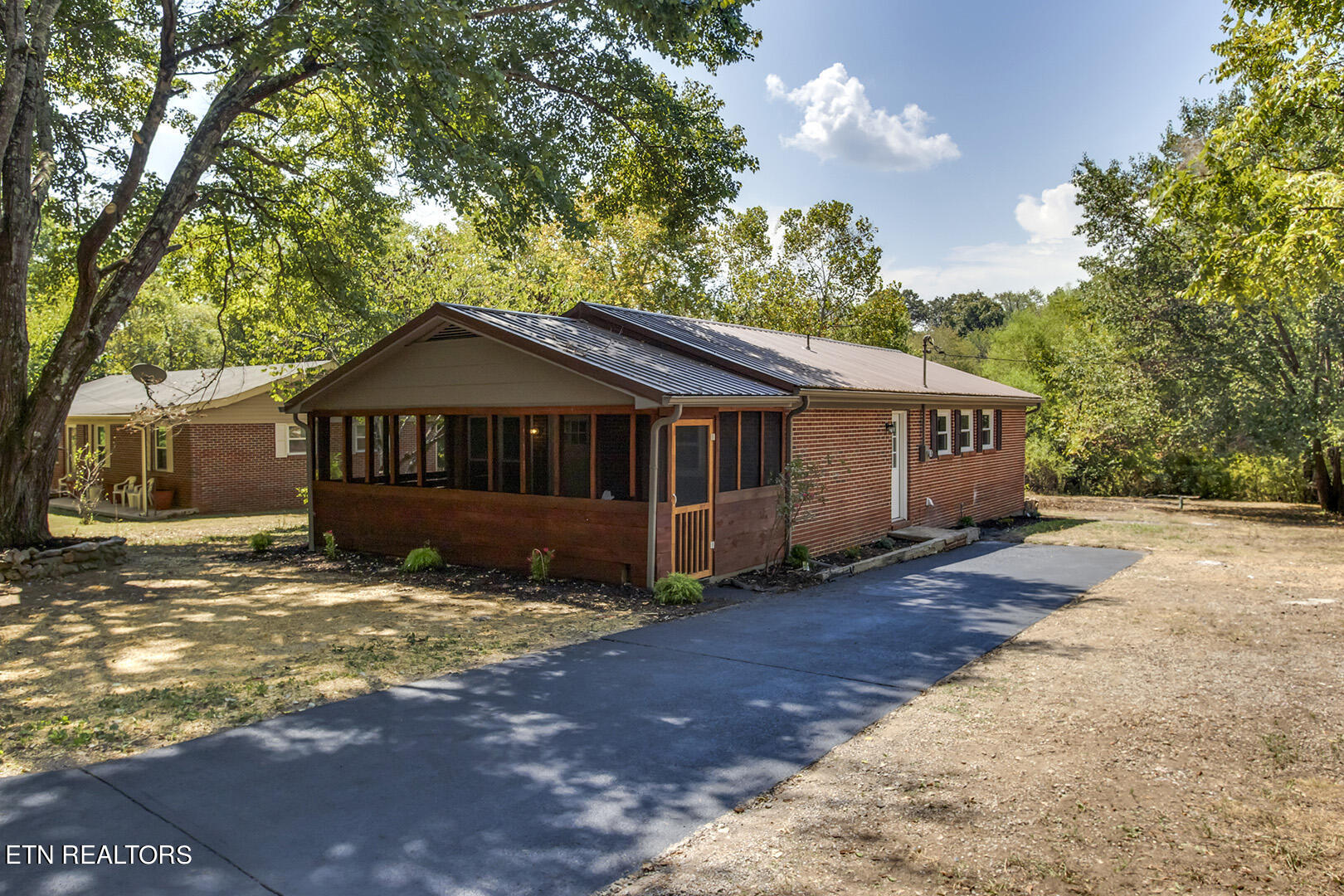 293 Jackson Drive Decatur, TN 37322 - Photo 1 of 30 01_JacksonLane_293_FrontLeft