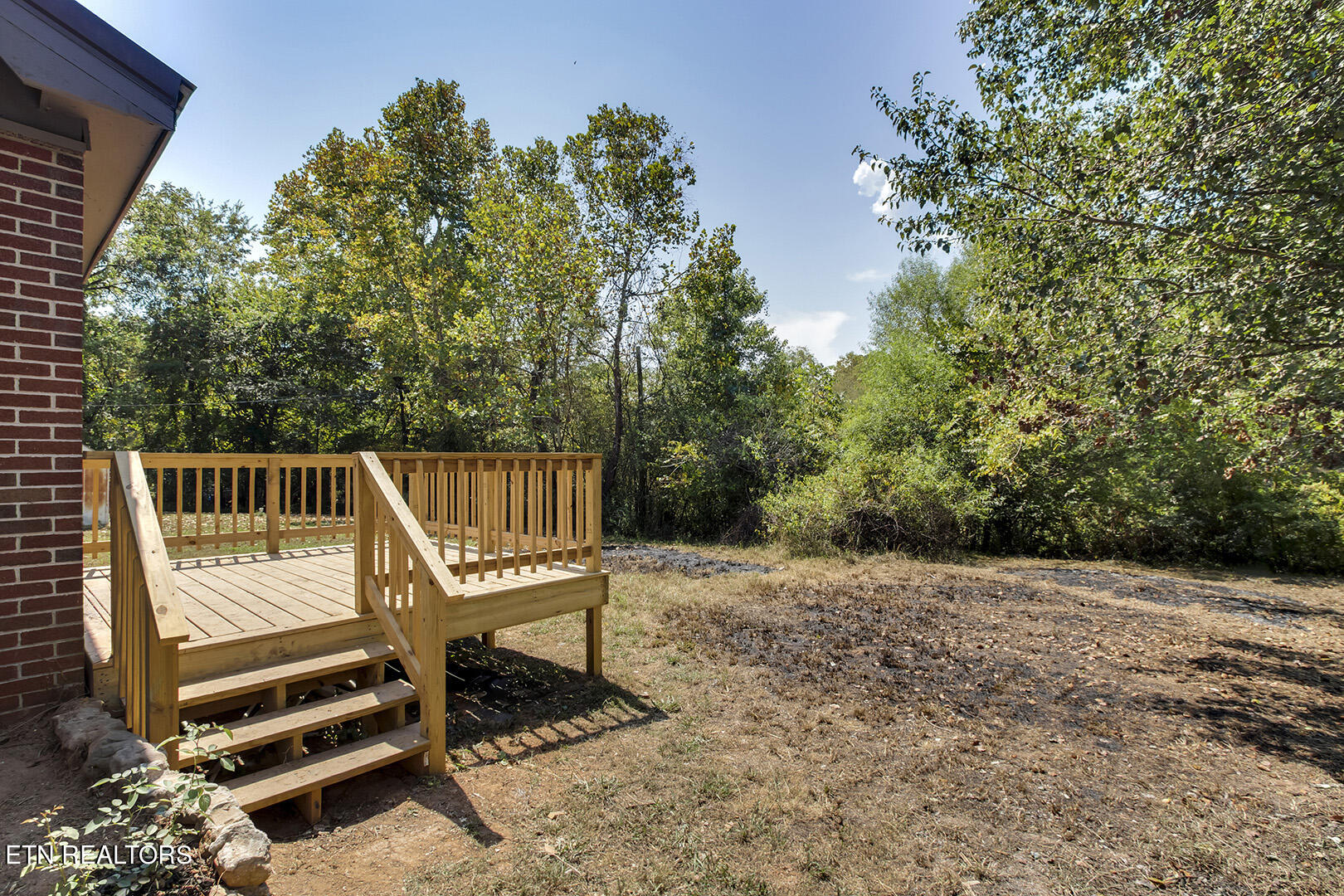 293 Jackson Drive Decatur, TN 37322 - Photo 27 of 30 27_JacksonLane_293_DeckEntry-Backyard