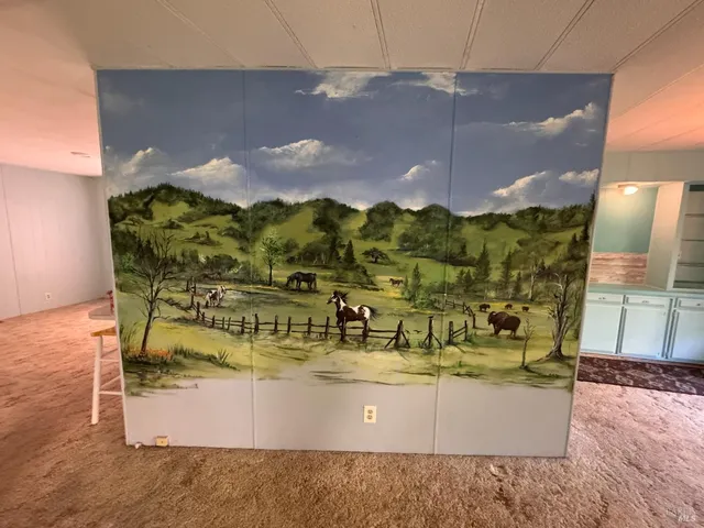 a view of a dining table with chairs