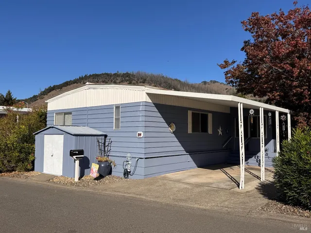 a front view of a house with a garage