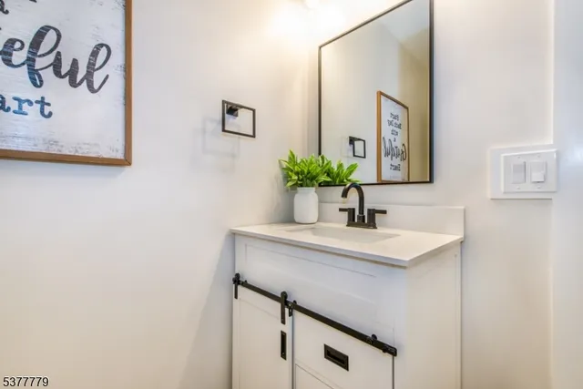 a sink with a mirror
