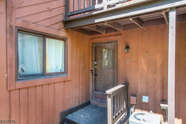 a bathroom with a toilet a sink and shower