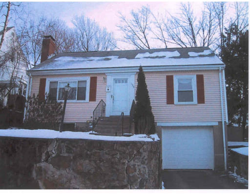 138 Florence Road Waltham, MA 02453 - Photo 1 of 1 a front view of a house with garden