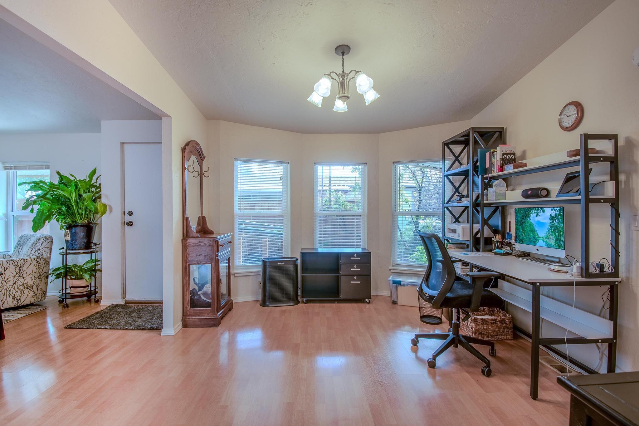 215 Tolman Creek Road, Unit SPC 11 Ashland, OR 97520 - Photo 11 of 36 a view of a livingroom with furniture and a potted plant