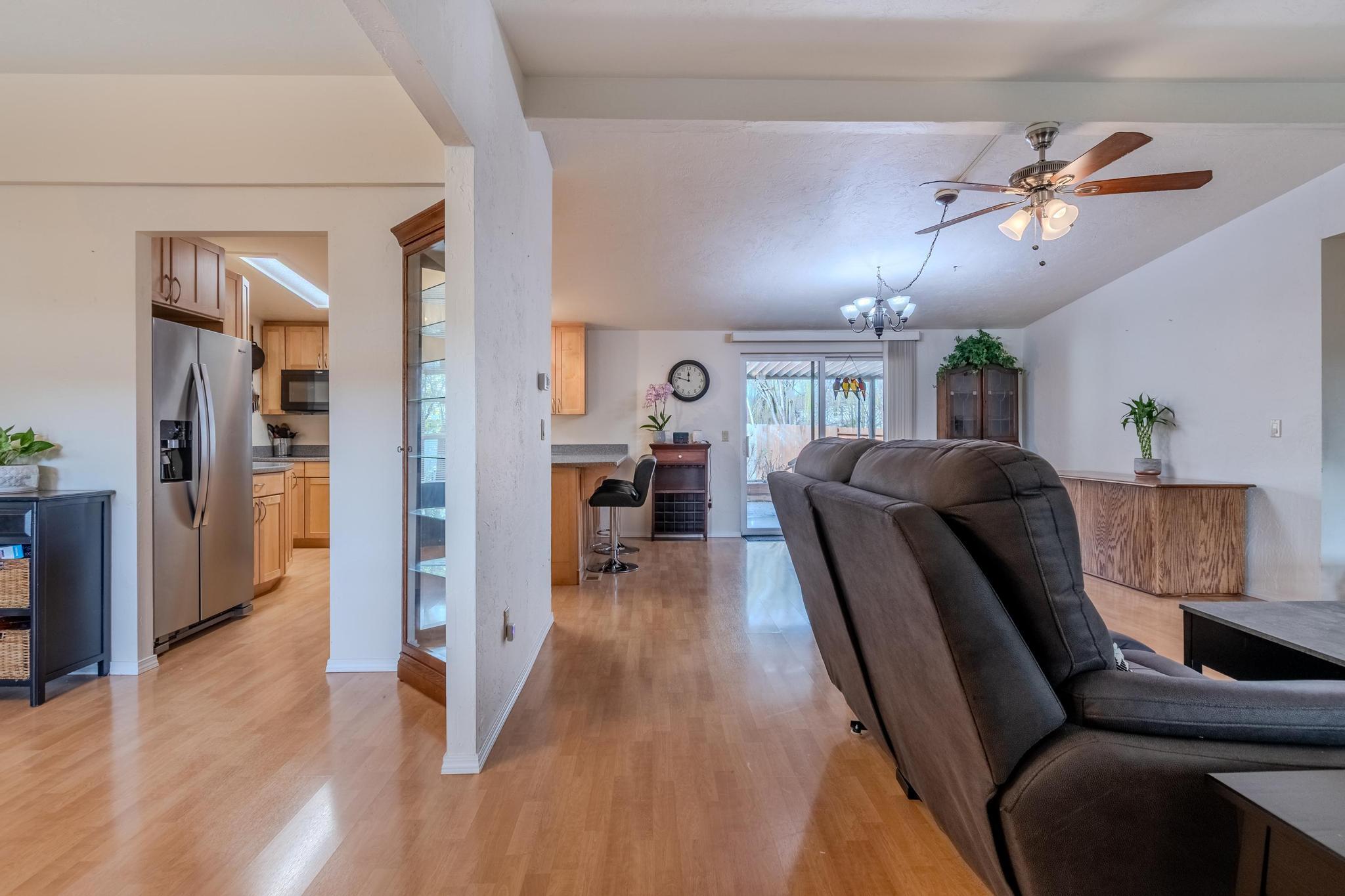 215 Tolman Creek Road, Unit SPC 11 Ashland, OR 97520 - Photo 13 of 36 a living room with furniture and wooden floor