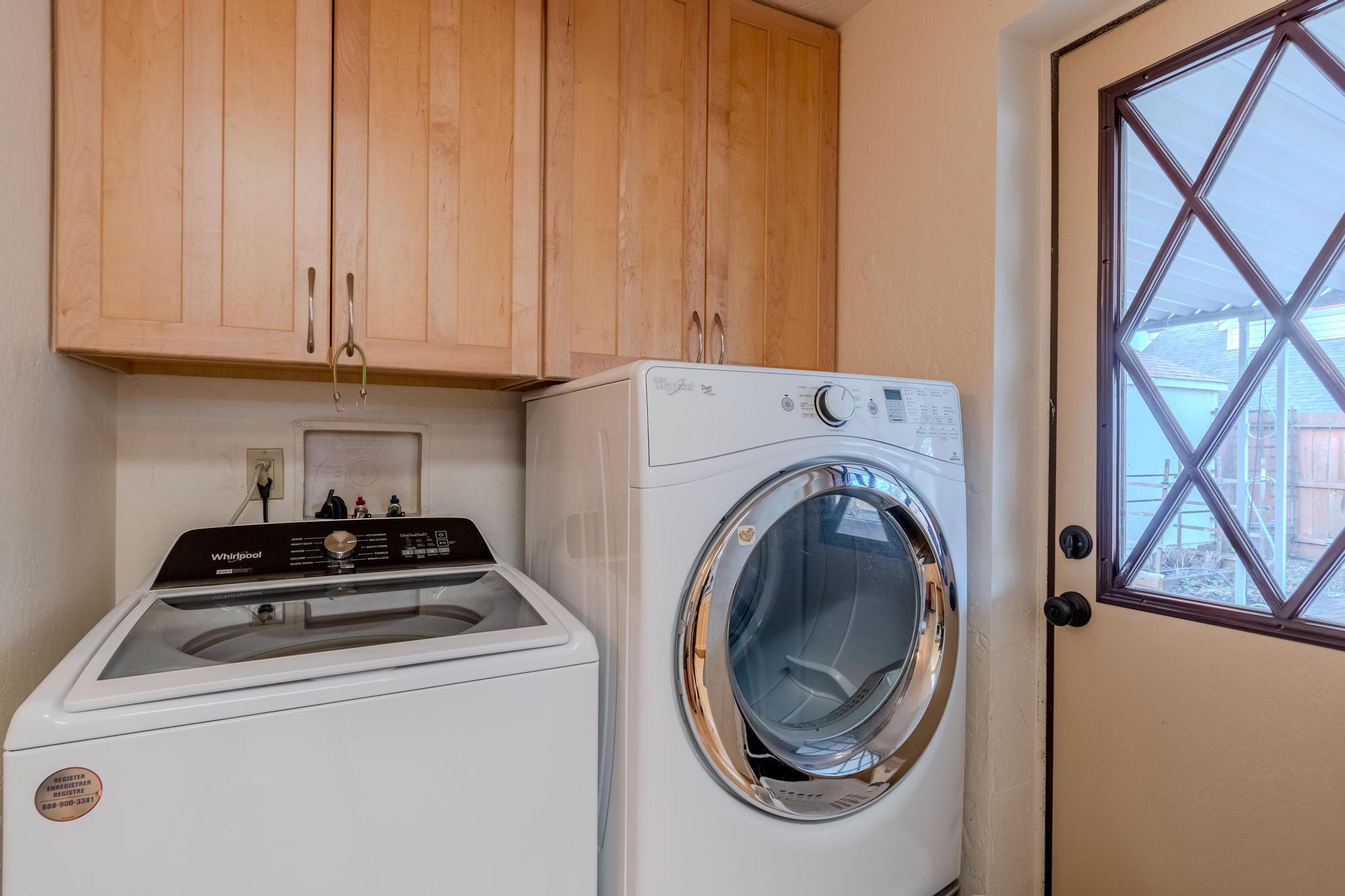215 Tolman Creek Road, Unit SPC 11 Ashland, OR 97520 - Photo 20 of 36 a utility room with dryer and washer