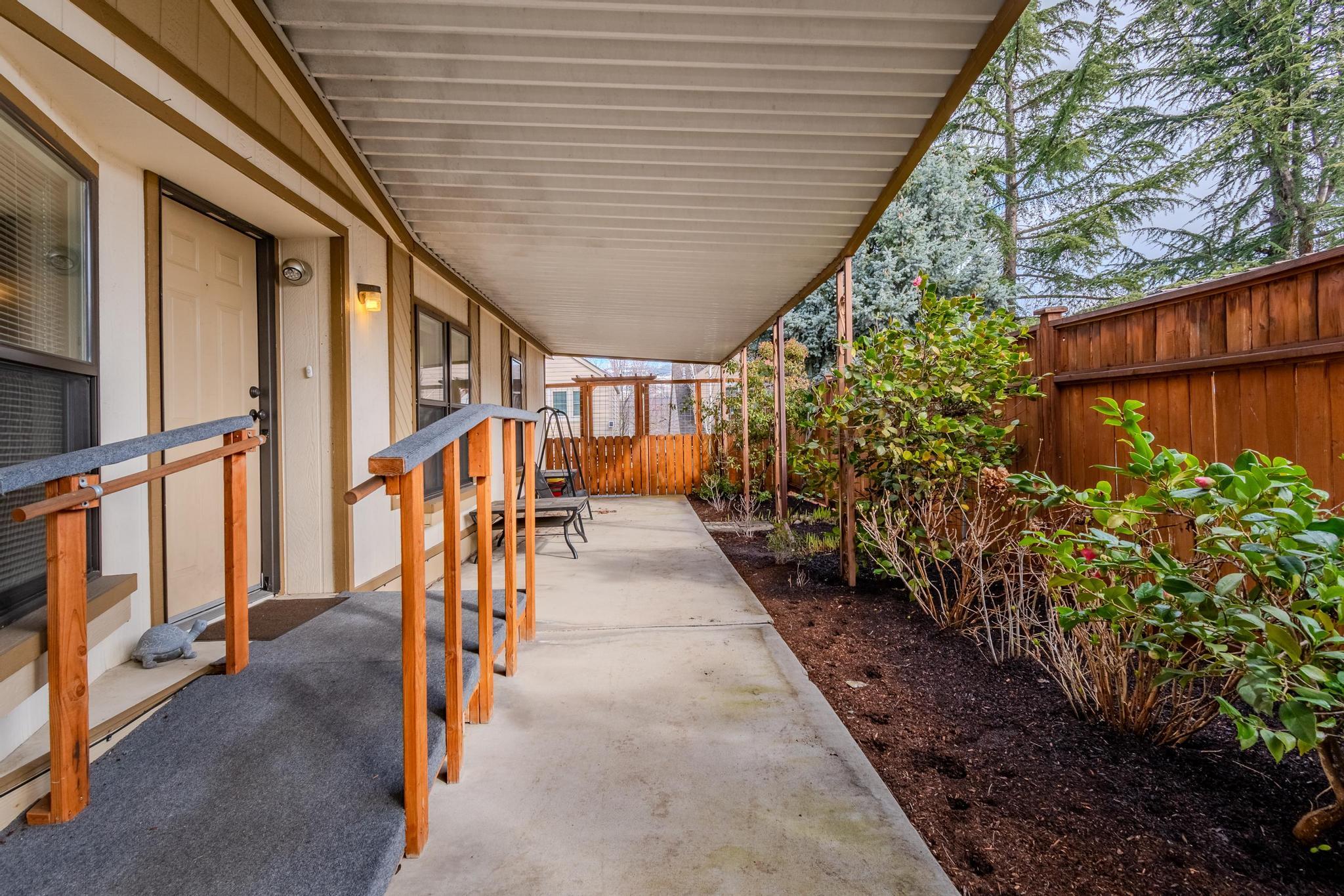 215 Tolman Creek Road, Unit SPC 11 Ashland, OR 97520 - Photo 2 of 36 a view of entryway with wooden floor and stairs