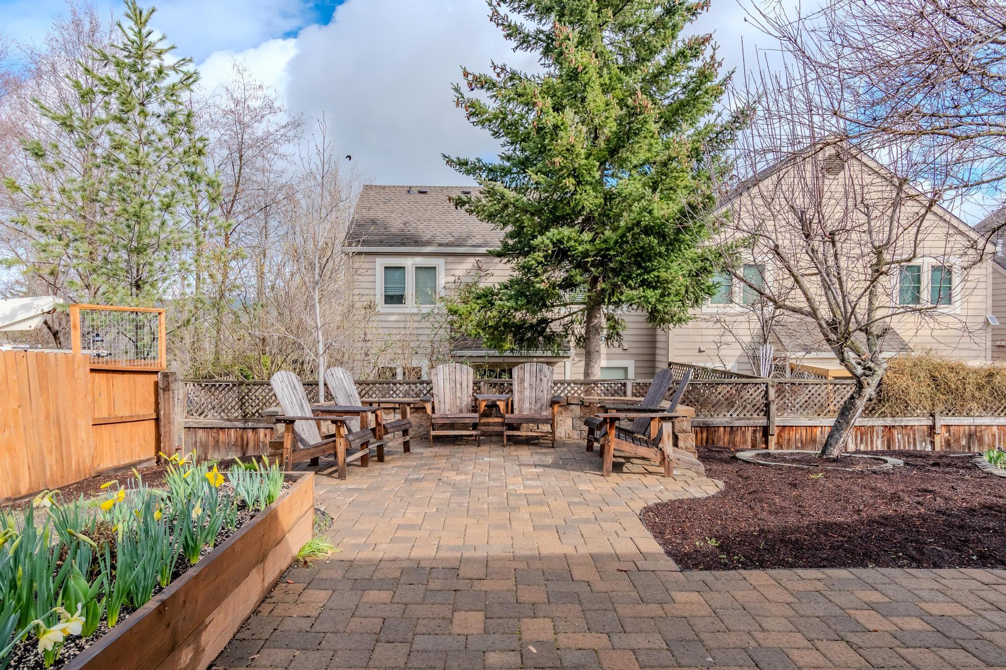 215 Tolman Creek Road, Unit SPC 11 Ashland, OR 97520 - Photo 24 of 36 a backyard of a house with outdoor seating