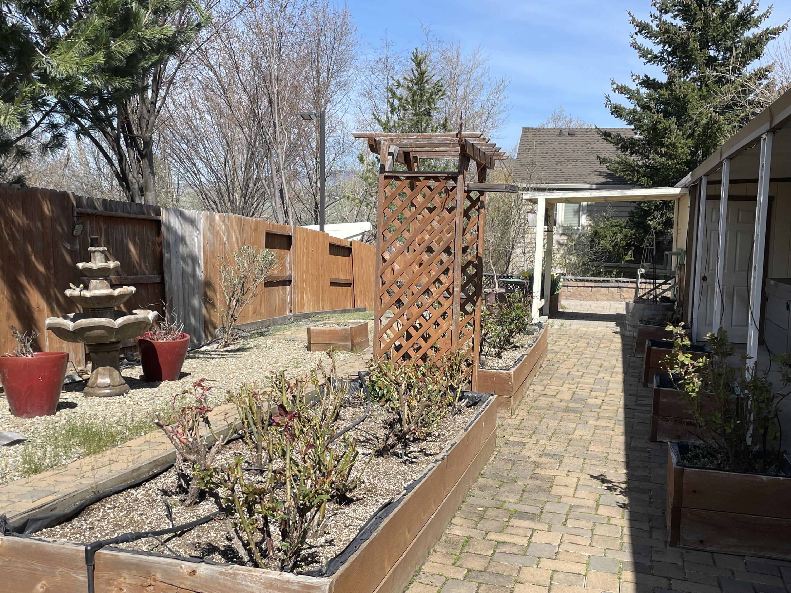 215 Tolman Creek Road, Unit SPC 11 Ashland, OR 97520 - Photo 27 of 36 a view of path along with potted plants
