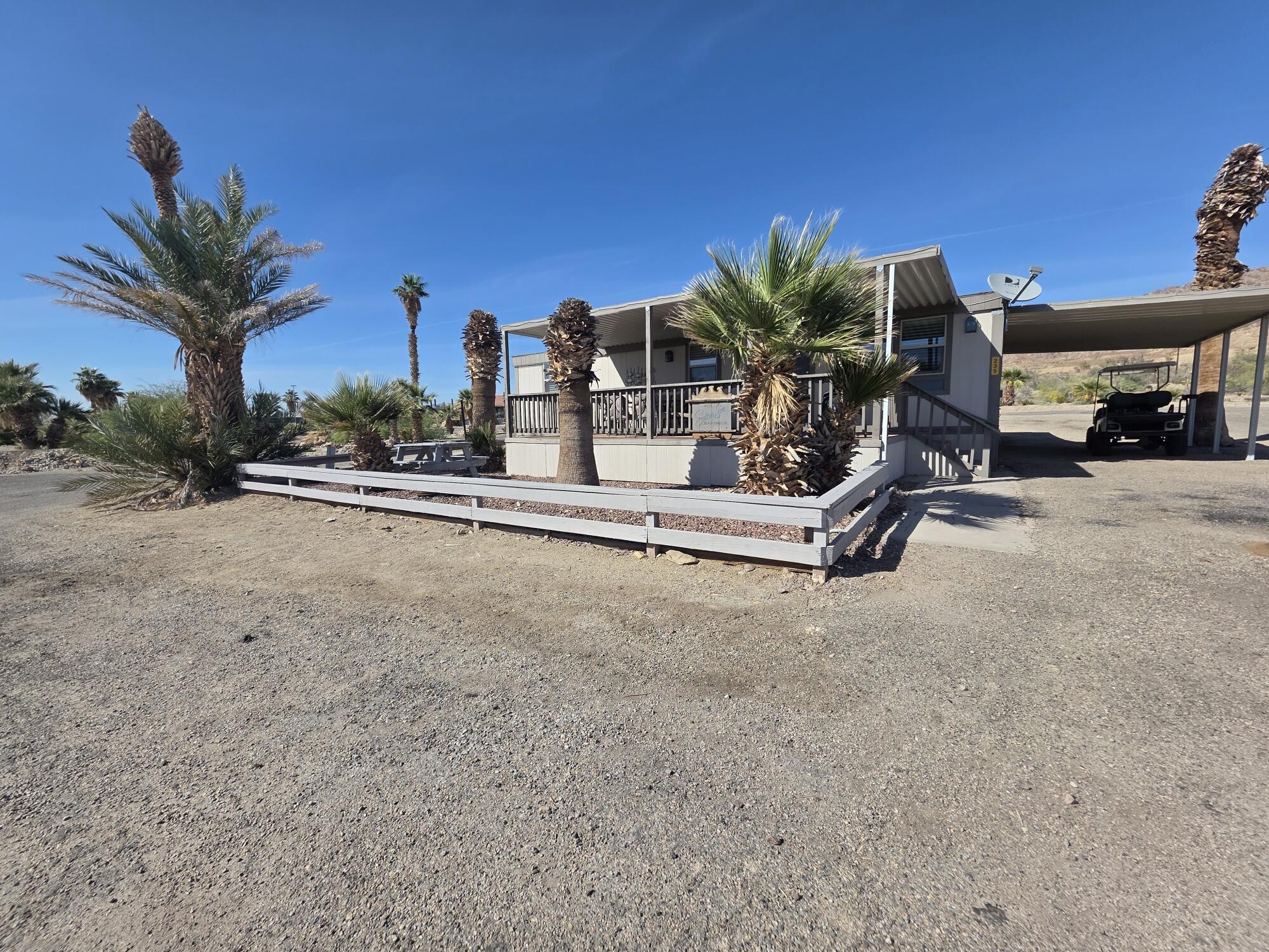 10595 Hot Mineral Spa Road, Unit 235 Niland, CA 92257 - Photo 37 of 45 a view of a house with a patio