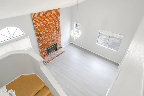 a view of an empty room and window