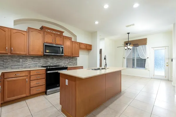 $500,000 | 13409 Via Roma Circle, Clermont, FL 34711