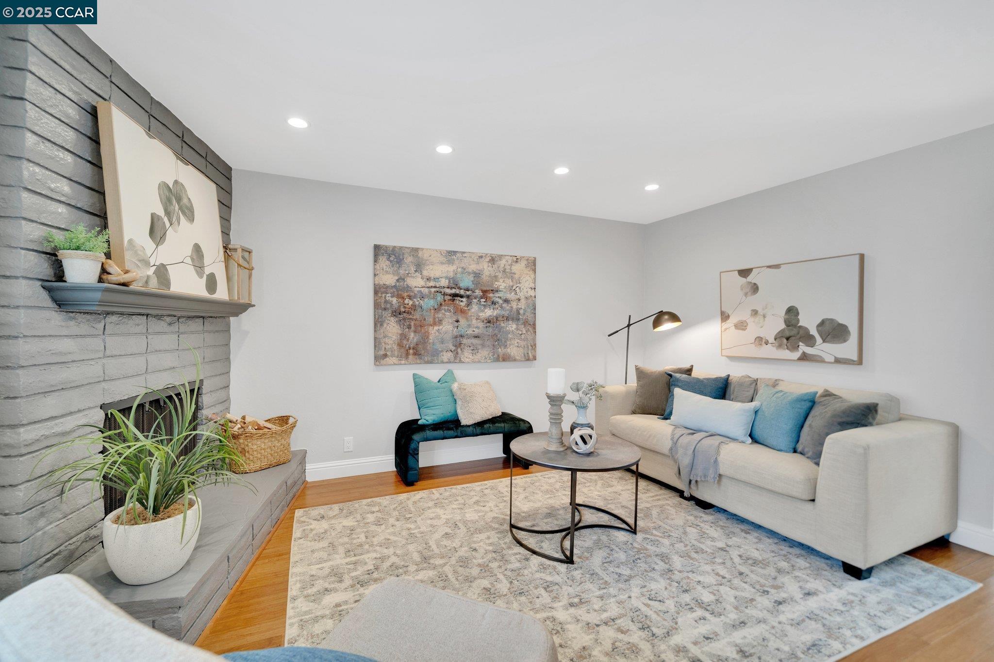 62 Miramonte Drive Moraga, CA 94556 - Photo 1 of 1 a living room with furniture and a potted plant