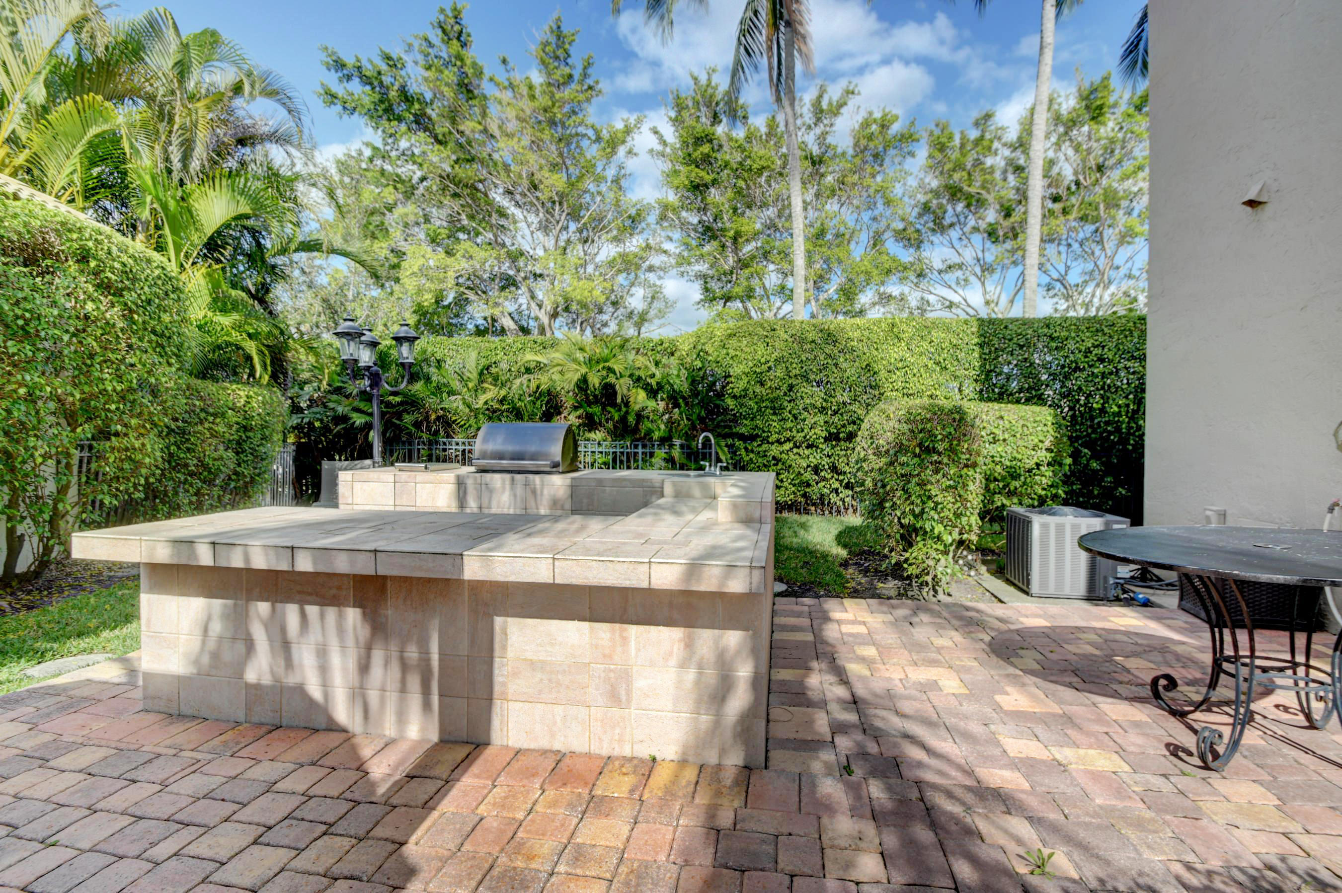 3387 Northwest 53rd Circle Boca Raton, FL 33496 - Photo 6 of 29 Summer Kitchen - 1