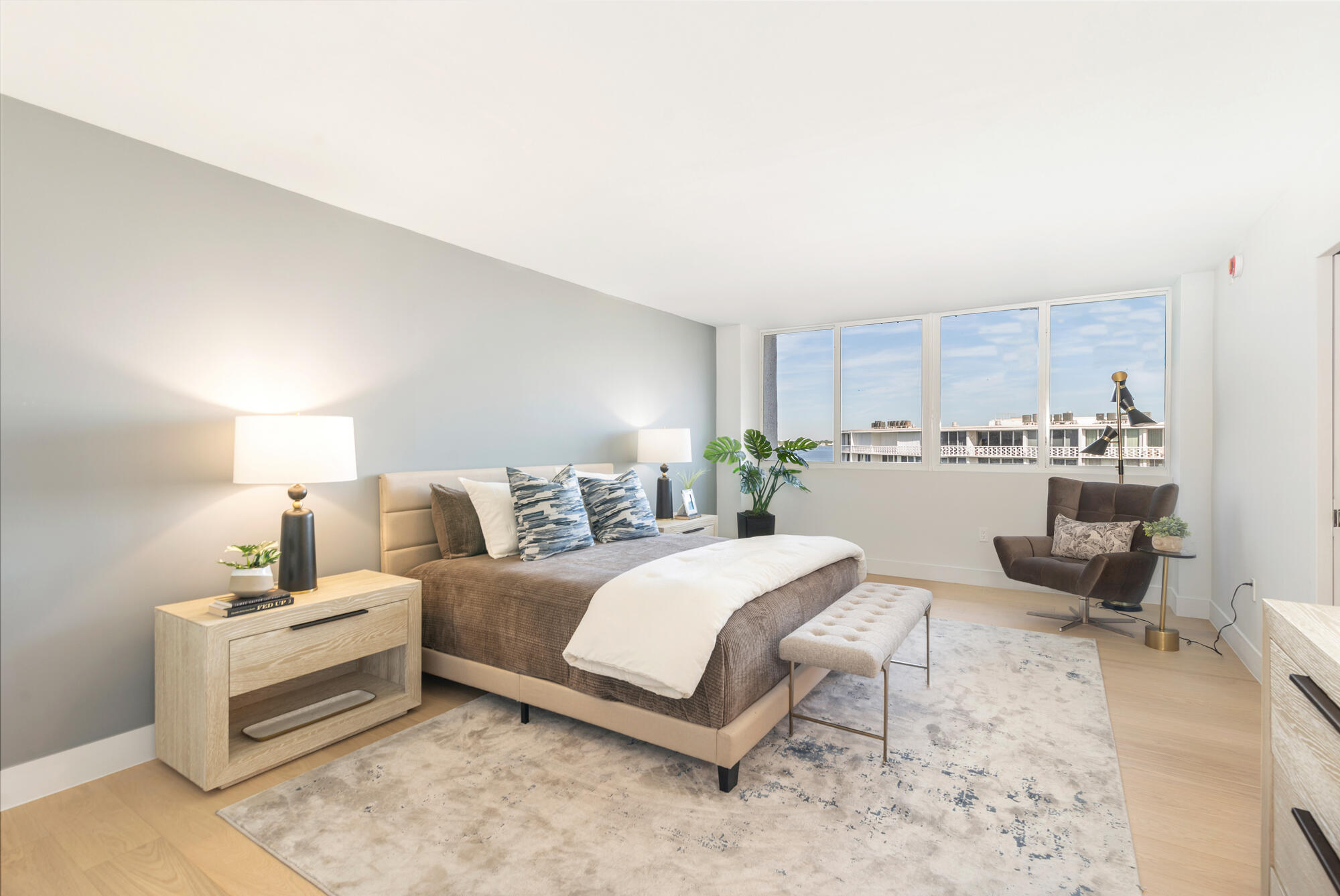 2773 South Ocean Boulevard, Unit 505 Palm Beach, FL 33480 - Photo 11 of 32 a bedroom with a bed and a view of kitchen