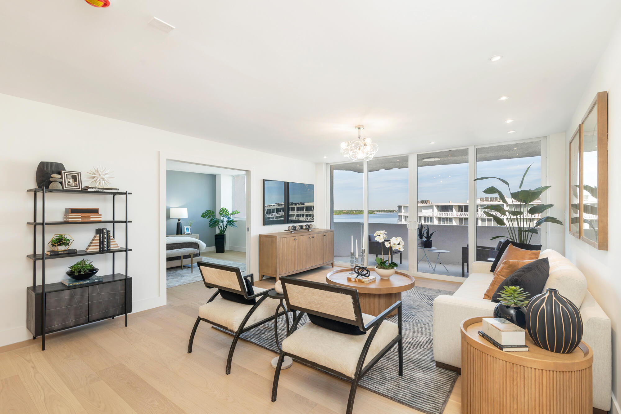 2773 South Ocean Boulevard, Unit 505 Palm Beach, FL 33480 - Photo 2 of 32 a living room with furniture and a table