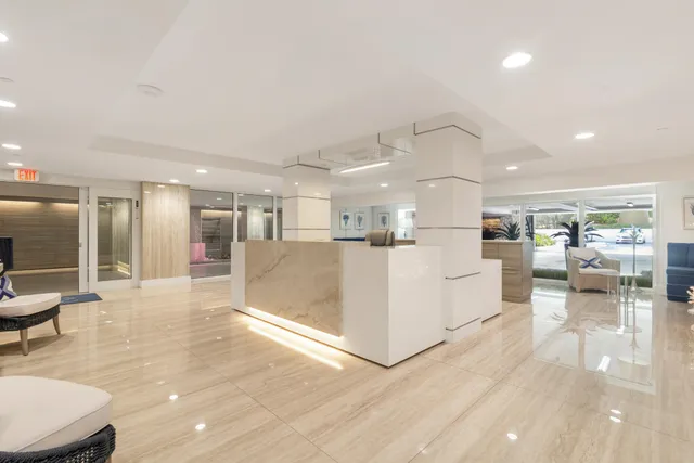 a view of a kitchen and dining room