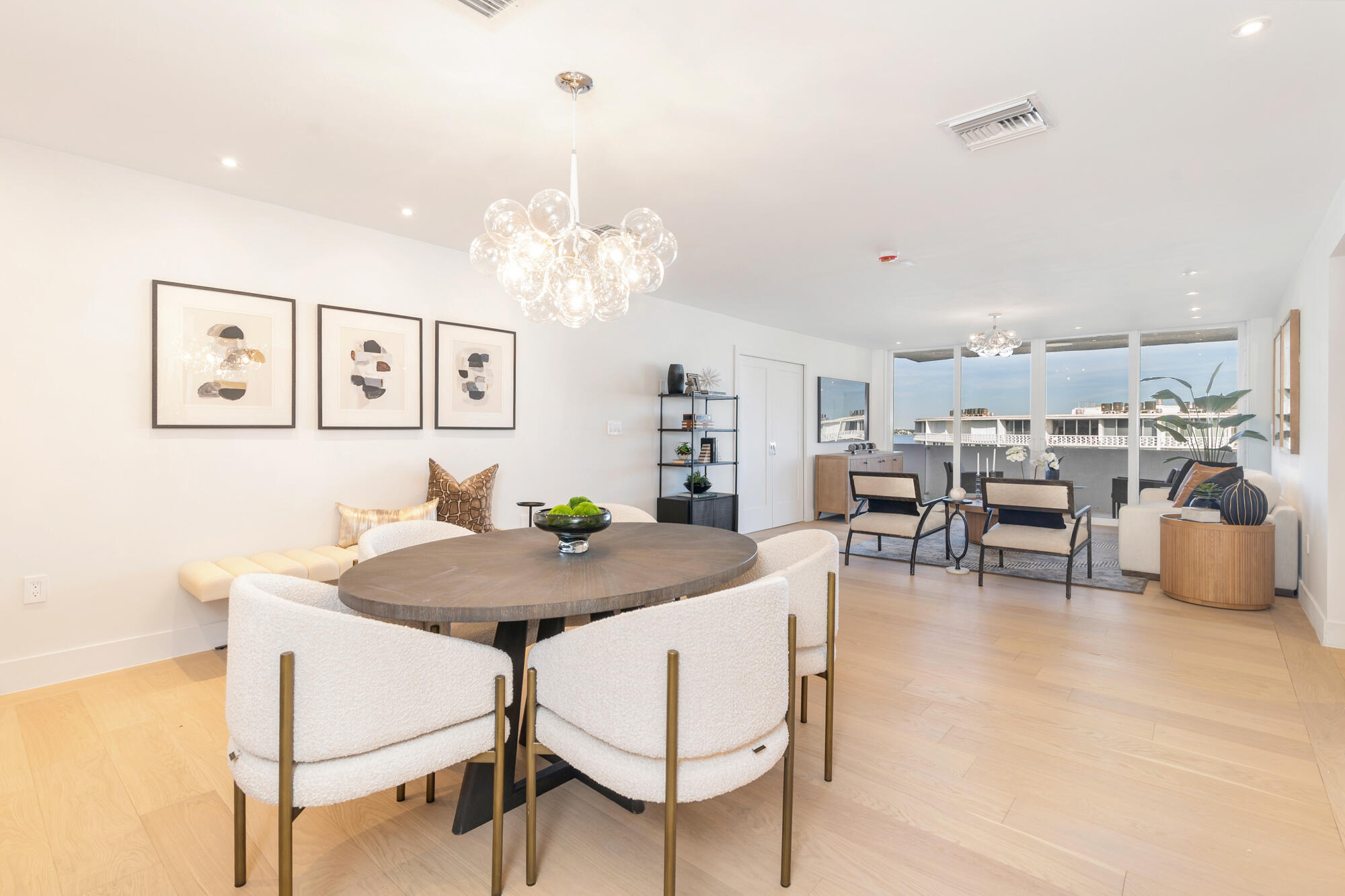 2773 South Ocean Boulevard, Unit 505 Palm Beach, FL 33480 - Photo 7 of 32 a view of a dining room with furniture and chandelier