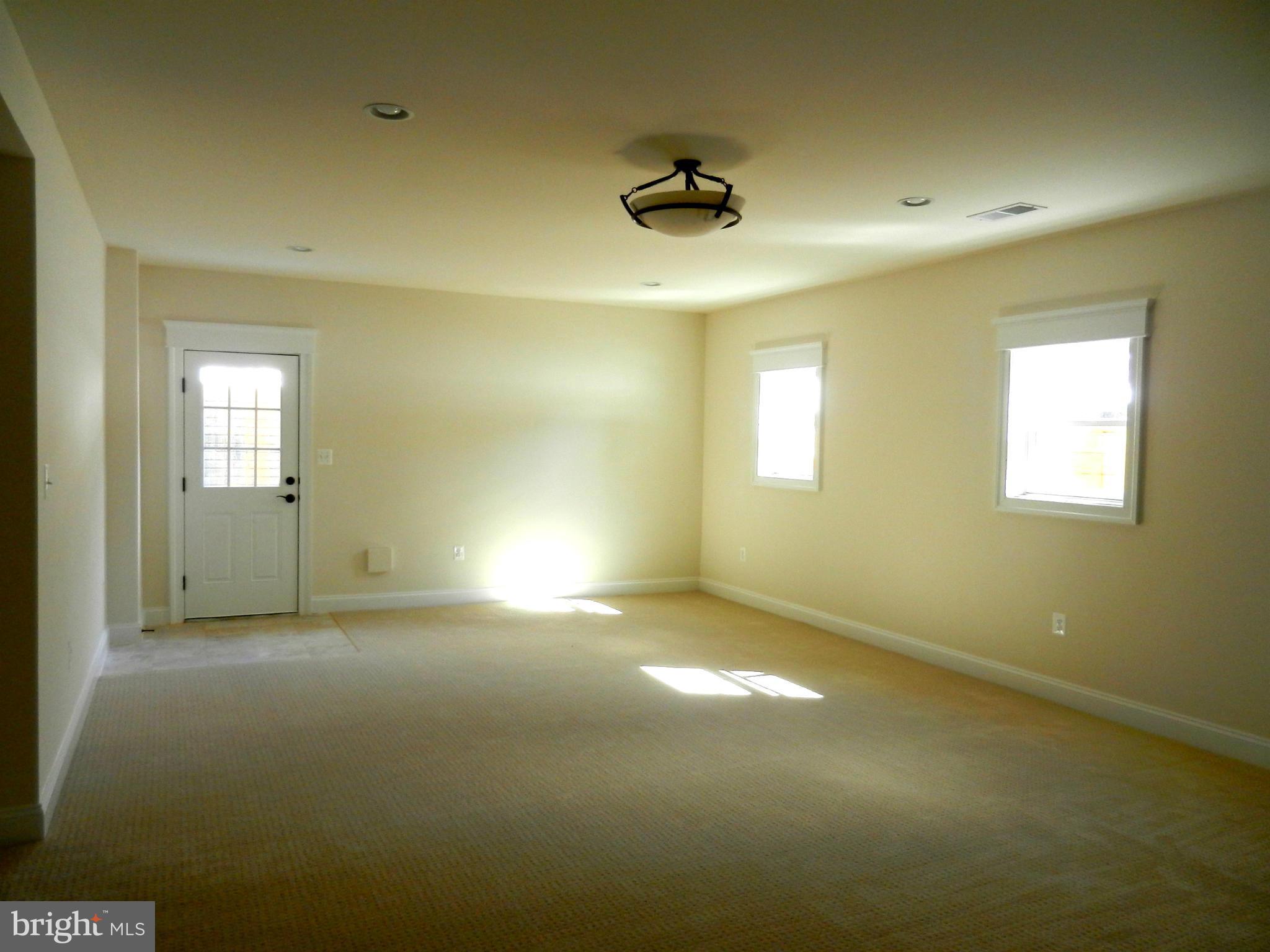 408 Tapawingo Road Southwest Vienna, VA 22180 - Photo 27 of 29 Large Rec Room Basement Walk Out