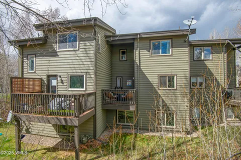 a view of house with a door and wooden floor