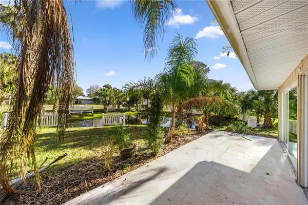 a view of swimming pool with a patio