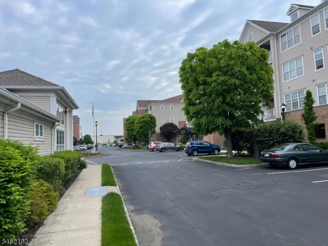 an outdoor space with swimming pool and furniture
